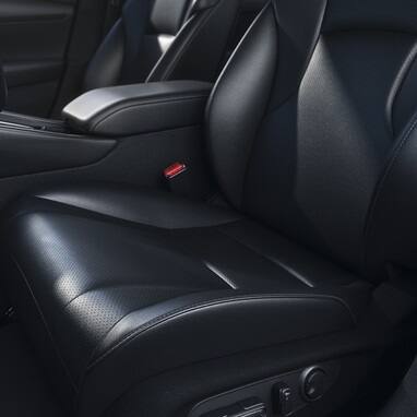2026 Honda Accord Black interior detail view of the lower portion of the drivers seat and adjustable seat buttons.